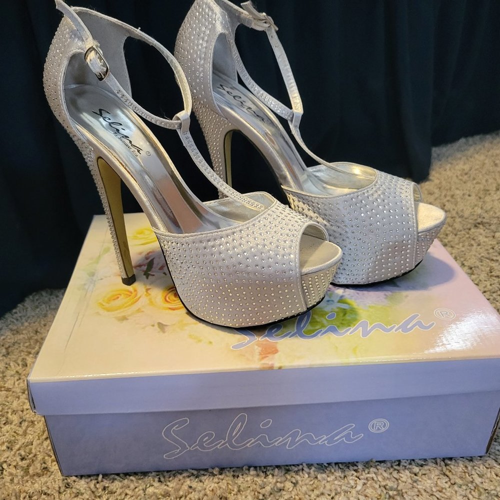 Size 8 silver platform heel with rhinestone detail
